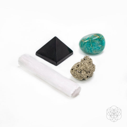 Workspace protection crystal kit with a selenite wand, hand-cut shungite pyramid, raw pyrite and tumbled amazonite — view 1 of 6