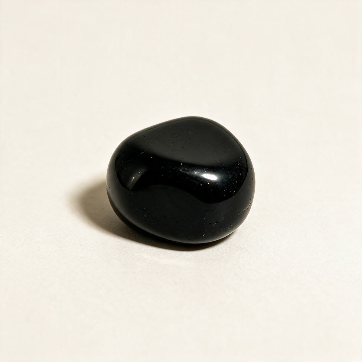 Black Obsidian Tumbled Pocket Stone — Truth, Protection & Shadow Work – product view