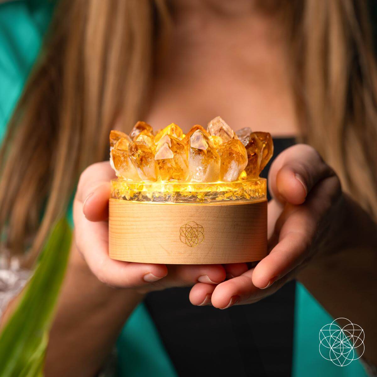 Citrine crystal lamp with golden points rising from a wooden base — view 6