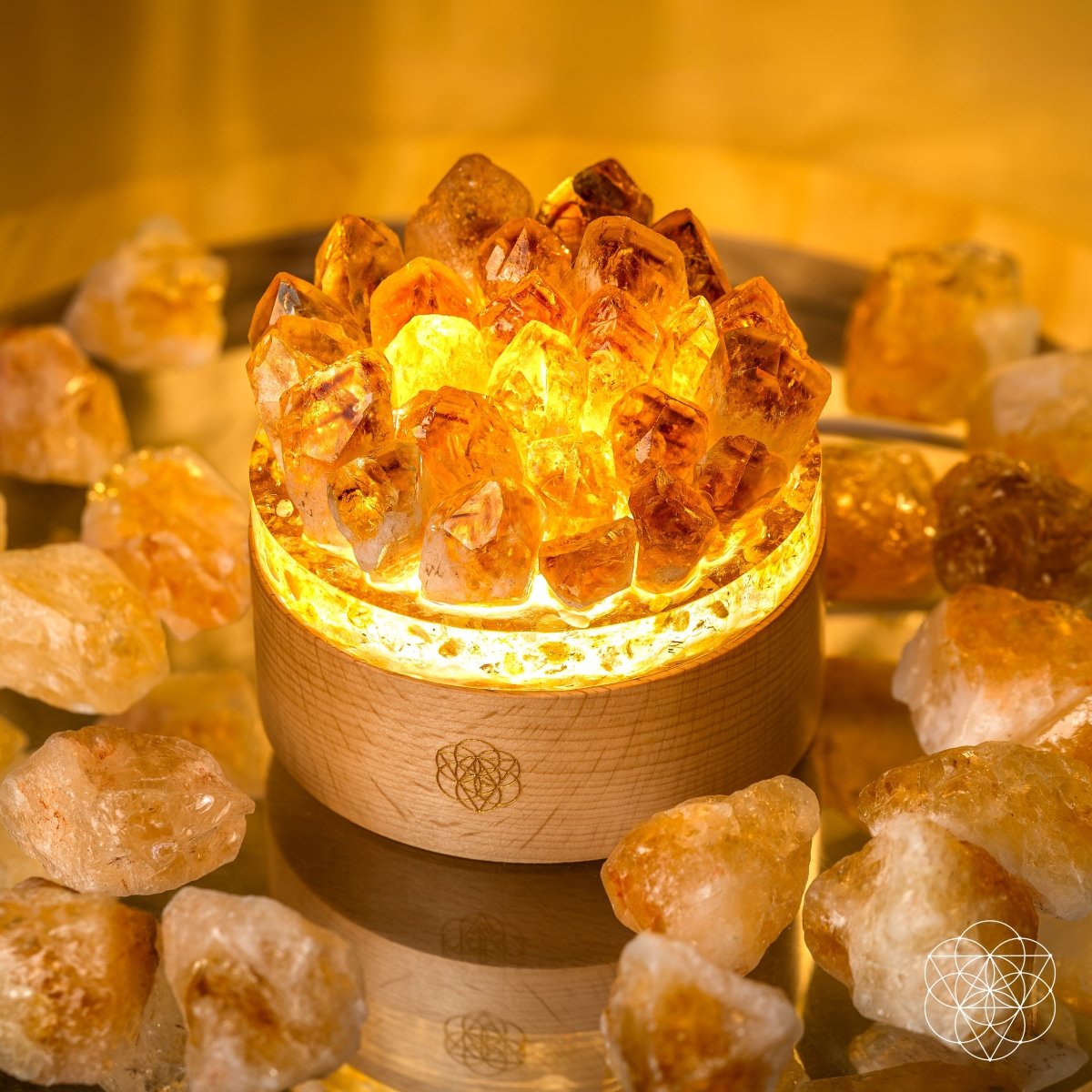 Citrine crystal lamp with golden points rising from a wooden base — view 3