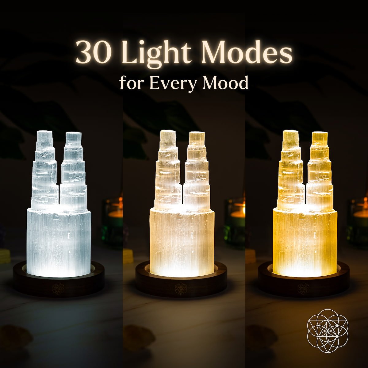Two carved Selenite towers glowing side by side on a wooden base — view 3