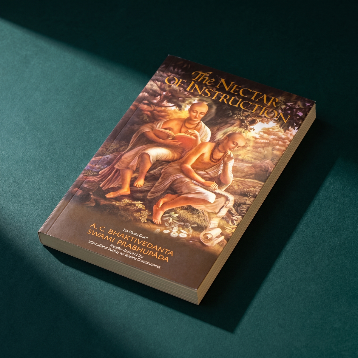 The Nectar of Instruction on deep teal fabric, the identical cover photograph shown a second time.