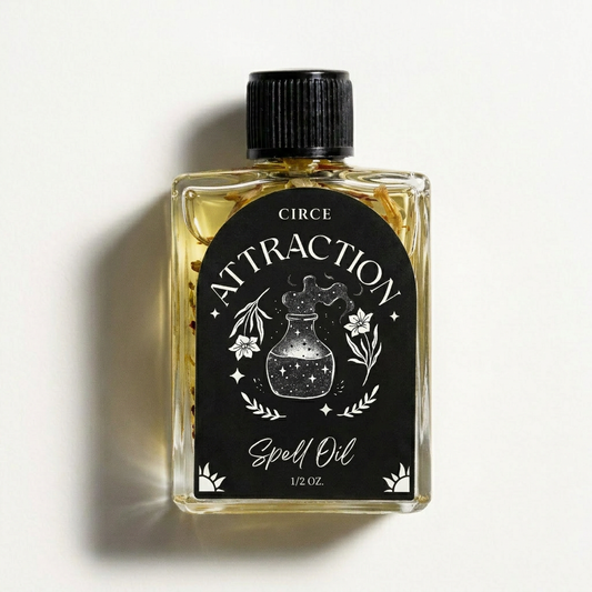 Attraction Ritual Oil, half-ounce twist-top glass bottle.