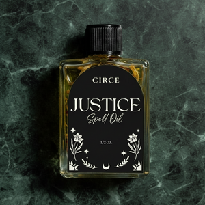 Justice Ritual Oil, .36 oz glass bottle.