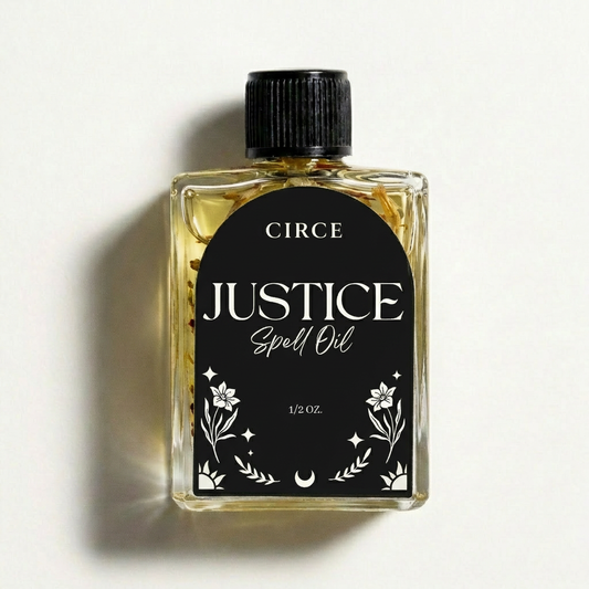 Justice Ritual Oil, .36 oz glass bottle.